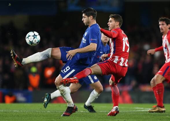 5th December 2017, Stamford Bridge, London, England; UEFA Champions League football, Chelsea versus Atletico Madrid; Lucas Hernandez of Atletico Madrid fouls Alvaro Morata of Chelsea from bhind  ActionPlus11959277