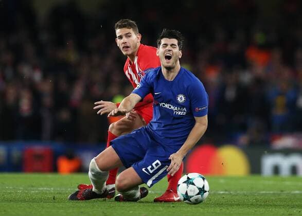 5th December 2017, Stamford Bridge, London, England; UEFA Champions League football, Chelsea versus Atletico Madrid; Lucas Hernandez of Atletico Madrid fouls Alvaro Morata of Chelsea  ActionPlus11959278