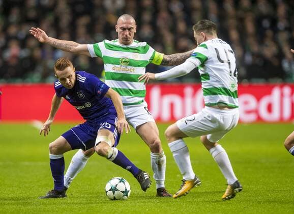 Scott Brown and Kieran Tierney of Celtic and Adrien Trebel of RSC Anderlech compete for the ball during the Champions League Group B match at the Celtic Park, Glasgow. Picture date: December 5th 2017. Picture credit should read: Craig Watson Sportimage EDITORIAL USE ONLY. No use with unauthorised audio, video, data, fixture lists, club league logos or live services. Online in-match use limited to 120 images, no video emulation. No use in betting, games or single club league player publications.