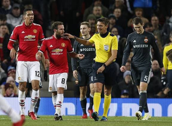 Juan Mata of Manchester United ManU complains to the referee Gianluca Rocchi following the goal for CSKA during the Champions League Group A match at the Old Trafford, Manchester. Picture date: December 5th 2017. Picture credit should read: Andrew Yates Sportimage EDITORIAL USE ONLY. No use with unauthorised audio, video, data, fixture lists, club league logos or live services. Online in-match use limited to 120 images, no video emulation. No use in betting, games or single club league player publications.