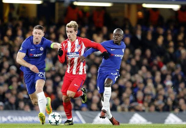 Antoine Griezmann of AtlŽtico de Madrid fends off Gary Cahill and N Golo KantŽ of Chelsea FC during the UEFA Champions League match between Chelsea and Atletico Madrid at Stamford Bridge, London, England on 5 December 2017. Copyright: xCarltonxMyriex 18110019