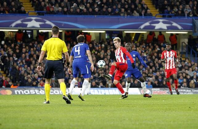 Antoine Griezmann of AtlŽtico de Madrid controls the ball with Cesc Fabregas of Chelsea FC in attendance during the UEFA Champions League match between Chelsea and Atletico Madrid at Stamford Bridge, London, England on 5 December 2017. Copyright: xCarltonxMyriex 18110021