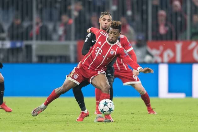 SOCCER - CL, Bayern vs PSG MUNICH,GERMANY,05.DEC.17 - SOCCER - UEFA Champions League, group stage, FC Bayern Muenchen vs Paris Saint-Germain FC. Image shows Layvin Kurzawa (PSG) and Kingsley Coman (Bayern). GEPAxpictures xMarkusxFischer