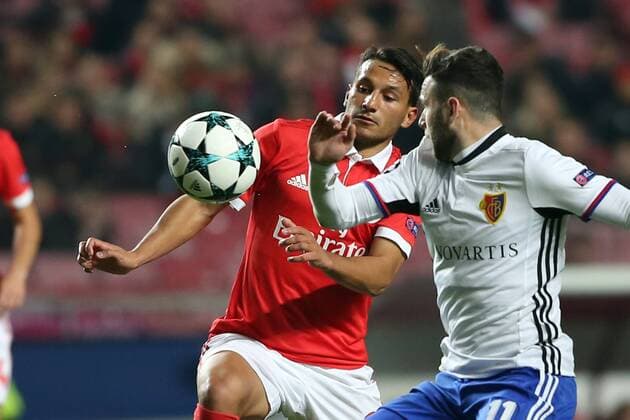 December 5, 2017 - Lisbon, Portugal - Benfica s Portuguese midfielder Joao Carvalho fights for the ball with Basel s midfielder Renato Steffen from Suisse (R ) during the UEFA Champions League Group A football match between SL Benfica and FC Basel at the Luz stadium in Lisbon, Portugal on December 5, 2017. Photo: UEFA Champions League group A football match SL Benfica vs FC Basel - ZUMAf123 20171205_zap_f123_003 Copyright: xPedroxFiuzax