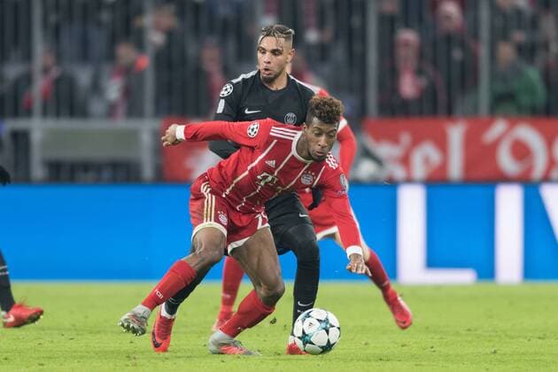 SOCCER - CL, Bayern vs PSG MUNICH,GERMANY,05.DEC.17 - SOCCER - UEFA Champions League, group stage, FC Bayern Muenchen vs Paris Saint-Germain FC. Image shows Layvin Kurzawa (PSG) and Kingsley Coman (Bayern). GEPAxpictures xMarkusxFischer