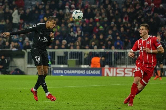 Muenchen Germany 05 12 2017 UEFA Champions League 2017 18 Season Group Stage Group B Matchday 6 FC Bayern Munich Paris Saint Germain Kylian Mbappe PSG tackles the 2 1 on the right Niklas Suele FCB comes to late DeFodi501