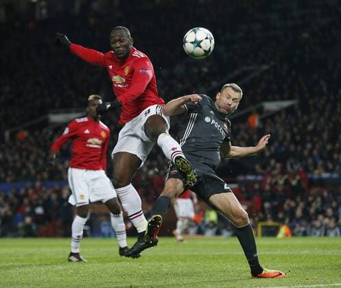 Romelu Lukaku of Manchester United ManU challenges Alan Dzagoev of CSKA Moscow during the Champions League Group A match at the Old Trafford, Manchester. Picture date: December 5th 2017. Picture credit should read: Andrew Yates Sportimage EDITORIAL USE ONLY. No use with unauthorised audio, video, data, fixture lists, club league logos or live services. Online in-match use limited to 120 images, no video emulation. No use in betting, games or single club league player publications.
