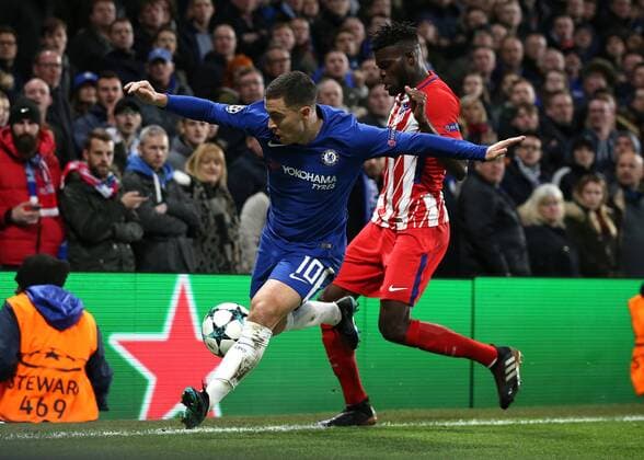 5th December 2017, Stamford Bridge, London, England; UEFA Champions League football, Chelsea versus Atletico Madrid; Thomas Partey of Atletico Madrid challenges Eden Hazard of Chelsea  ActionPlus11959335
