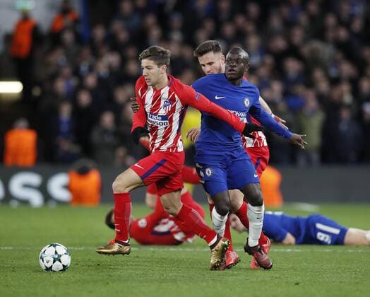 Luciano Vietto of Atletico Madrid goes past Ngolo Kante of Chelsea during the Champions League Group C match at the Stamford Bridge, London. Picture date: December 5th 2017. Picture credit should read: David Klein Sportimage EDITORIAL USE ONLY. No use with unauthorised audio, video, data, fixture lists, club league logos or live services. Online in-match use limited to 120 images, no video emulation. No use in betting, games or single club league player publications.