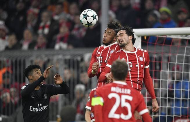 Head dueling Mats Hummels FC Bayern Munich and Corentin Tolisso Bayern Munich clear together Champions League CL Group stage FC Bayern Munich FCB vs FC Paris Saint Germain PSG 05 12 2017 FC Bayern Munich FCB vs FC Paris Saint Germain PSG