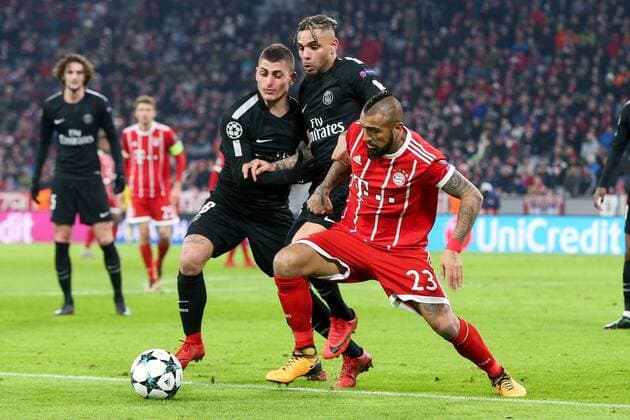 In action with Marco Verratti 6 Paris Saint Germain Layvin Kurzawa 20 Paris Saint Germain and Arturo Vidal 23 FC Bayern Muenchen FC Bayern Munich vs Paris Saint Germain Football Preliminary Round Champions League 05 12 2017 Muenchen Bayern Germany Copyright: xkolbert-press ChristianxKolbertx