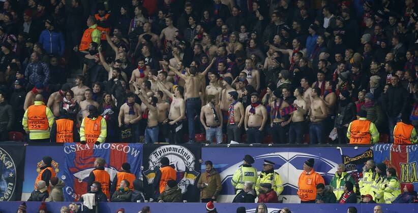 CSKA Moscow fans take off their shirts during the Champions League Group A match at the Old Trafford, Manchester. Picture date: December 5th 2017. Picture credit should read: Andrew Yates Sportimage EDITORIAL USE ONLY. No use with unauthorised audio, video, data, fixture lists, club league logos or live services. Online in-match use limited to 120 images, no video emulation. No use in betting, games or single club league player publications.