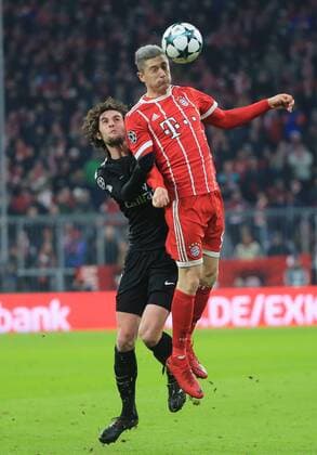 (171206) -- MUNICH, Dec. 6, 2017 -- Robert Lewandowski (R) of Bayern Munich competes with Adrien Rabiot of Paris Saint-Germain during a UEFA Champions League group B match between Bayern Munich and Paris Saint-Germain in Munich, Germany, Dec. 5, 2017. Bayern won 3-1. ) (SP)GERMANY-MUNICH-CHAMPIONS LEAGUE-BAYERN-PSG PhilippexRuiz 