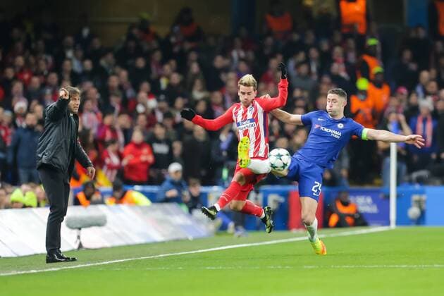 (171206) -- LONDON, Dec. 6, 2017 -- Antoine Griezmann of Atletico Madrid battles with Gary Cahill(R) of Chelsea during the UEFA Champions League Group C match between Chelsea and Atletico Madrid at Stamford Bridge in London, Britain on Dec. 5, 2017. The match drew 1-1. ) (SP)BRITAIN-LONDON-FOOTBALL-UEFA CHAMPIONS LEAGUE-CHELSEA VS ATLETICO MADRID RichardxWashbrooke 