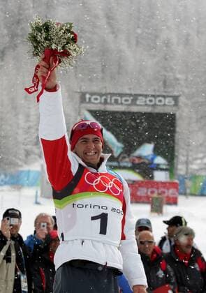 Michael Greis is pleased at the award ceremony in San Sicario on 25 02 2006 biathlon Olympic Games 2006 San Sicario, Italy