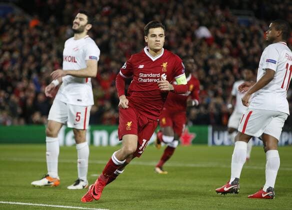 Philippe Coutinho of Liverpool celebrates scoring the first goal during the Champions League Group E match at the Anfield Stadium, Liverpool. Picture date: December 6th 2017. Picture credit should read: Andrew Yates Sportimage EDITORIAL USE ONLY. No use with unauthorised audio, video, data, fixture lists, club league logos or live services. Online in-match use limited to 120 images, no video emulation. No use in betting, games or single club league player publications.