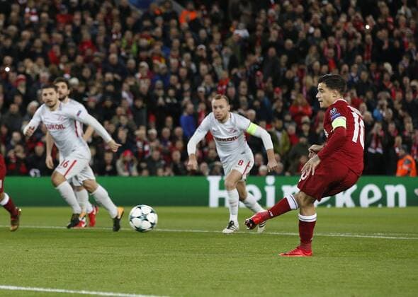 Philippe Coutinho of Liverpool scores form the penalty spot during the Champions League Group E match at the Anfield Stadium, Liverpool. Picture date: December 6th 2017. Picture credit should read: Andrew Yates Sportimage EDITORIAL USE ONLY. No use with unauthorised audio, video, data, fixture lists, club league logos or live services. Online in-match use limited to 120 images, no video emulation. No use in betting, games or single club league player publications.