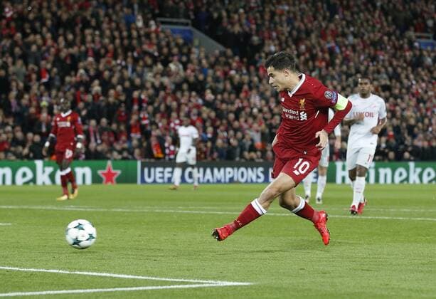 Philippe Coutinho of Liverpool scores the second goal during the Champions League Group E match at the Anfield Stadium, Liverpool. Picture date: December 6th 2017. Picture credit should read: Andrew Yates Sportimage EDITORIAL USE ONLY. No use with unauthorised audio, video, data, fixture lists, club league logos or live services. Online in-match use limited to 120 images, no video emulation. No use in betting, games or single club league player publications.