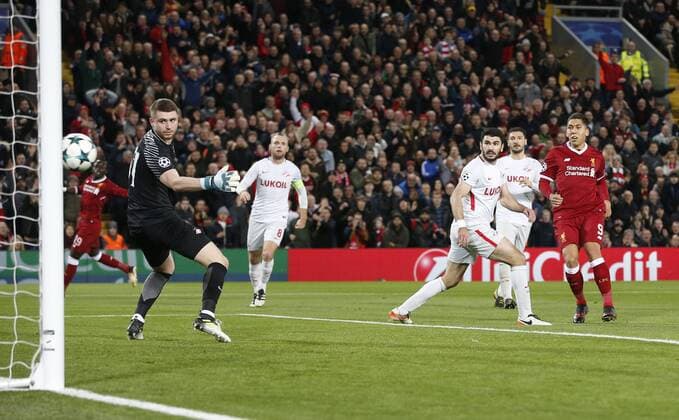 Roberto Firmino of Liverpool scores the third goal during the Champions League Group E match at the Anfield Stadium, Liverpool. Picture date: December 6th 2017. Picture credit should read: Andrew Yates Sportimage EDITORIAL USE ONLY. No use with unauthorised audio, video, data, fixture lists, club league logos or live services. Online in-match use limited to 120 images, no video emulation. No use in betting, games or single club league player publications.