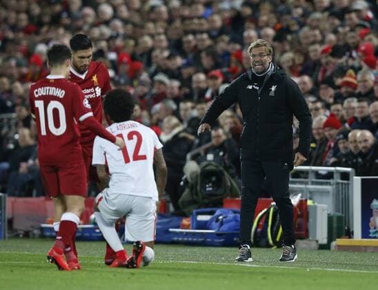Jurgen Klopp manager of Liverpool shouts at Luiz Adriano of Spartak Moscow during the Champions League Group E match at the Anfield Stadium, Liverpool. Picture date: December 6th 2017. Picture credit should read: Andrew Yates Sportimage EDITORIAL USE ONLY. No use with unauthorised audio, video, data, fixture lists, club league logos or live services. Online in-match use limited to 120 images, no video emulation. No use in betting, games or single club league player publications.