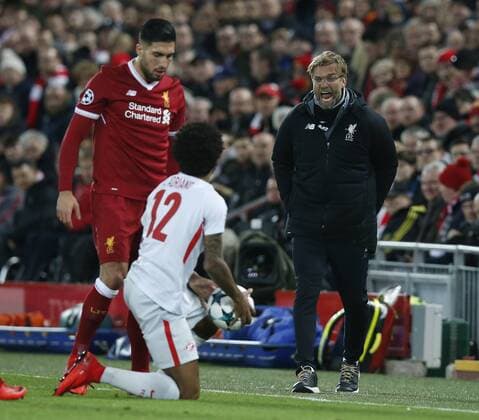 Jurgen Klopp manager of Liverpool shouts at Luiz Adriano of Spartak Moscow during the Champions League Group E match at the Anfield Stadium, Liverpool. Picture date: December 6th 2017. Picture credit should read: Andrew Yates Sportimage EDITORIAL USE ONLY. No use with unauthorised audio, video, data, fixture lists, club league logos or live services. Online in-match use limited to 120 images, no video emulation. No use in betting, games or single club league player publications.