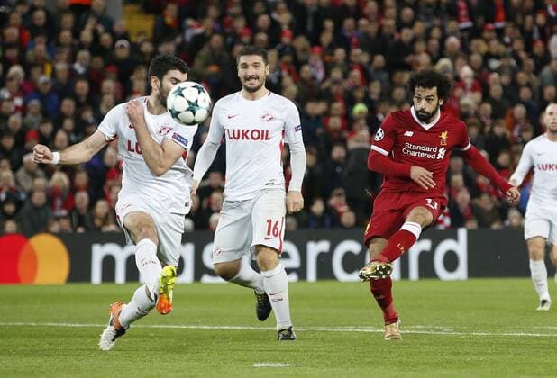 Mohamed Salah of Liverpool takes a shot on goal during the Champions League Group E match at the Anfield Stadium, Liverpool. Picture date: December 6th 2017. Picture credit should read: Andrew Yates Sportimage EDITORIAL USE ONLY. No use with unauthorised audio, video, data, fixture lists, club league logos or live services. Online in-match use limited to 120 images, no video emulation. No use in betting, games or single club league player publications.