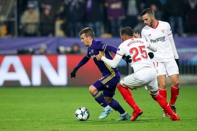 SOCCER - CL, Maribor vs Sevilla MARIBOR,SLOVENIA,05.DEC.17 - SOCCER - UEFA Champions League, group stage, NK Maribor vs FC Sevilla. Image shows Damjan Bohar (Maribor) and Gabriel Mercado (Sevilla). GEPAxpictures xMaticxKlansek