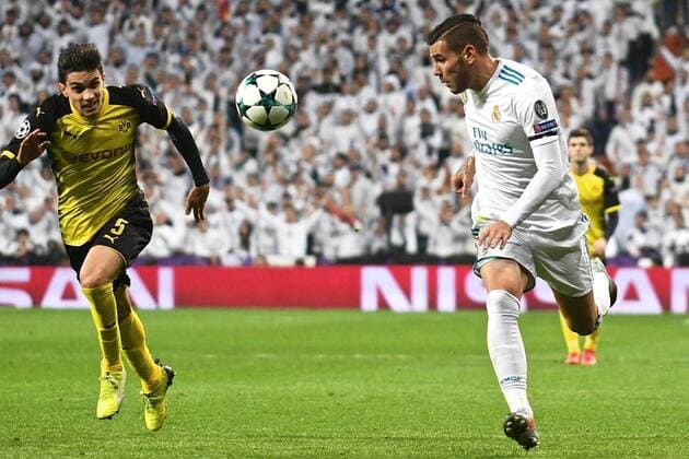 Real Madrid v Borussia Dortmund UEFA Champions League Theo Hernandez of Real Madrid (right) and Marc Bartra of Borussia Dortmund (left) during the UEFA Champions League match at the Estadio Santiago Bernabeu, Madrid Content Not Available For UK Newspapers Copyright: xKristianxKanex FIL-11059-0028