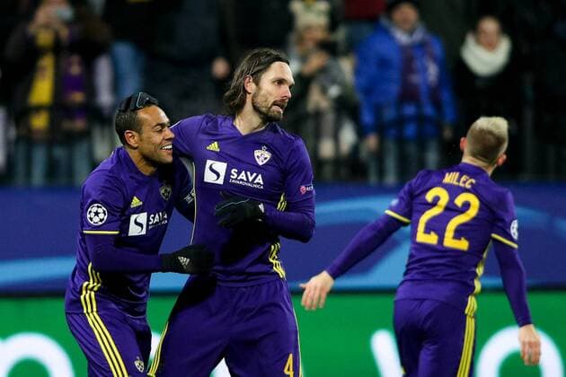 SOCCER - CL, Maribor vs Sevilla MARIBOR,SLOVENIA,05.DEC.17 - SOCCER - UEFA Champions League, group stage, NK Maribor vs FC Sevilla. Image shows the rejoicing of Marcos Tavares (Maribor) and Marko Suler (Maribor). GEPAxpictures xMaticxKlansek