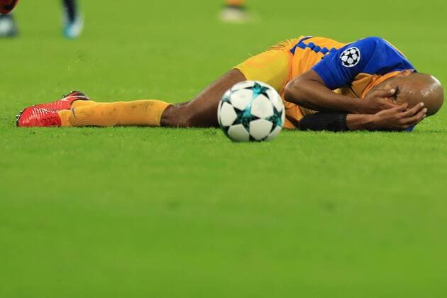 6th December 2017, Wembley Stadium, London England; UEFA Champions League football, Tottenham Hotspur versus Apoel Nicosia; Carl& xe3;o of Apoel FC goes down injured  ActionPlus11959597