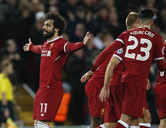 Mohamed Salah of Liverpool celebrates scoring the seventh goal during the Champions League Group E match at the Anfield Stadium, Liverpool. Picture date: December 6th 2017. Picture credit should read: Andrew Yates Sportimage EDITORIAL USE ONLY. No use with unauthorised audio, video, data, fixture lists, club league logos or live services. Online in-match use limited to 120 images, no video emulation. No use in betting, games or single club league player publications.