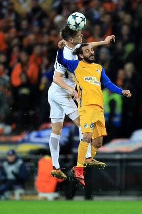 6th December 2017, Wembley Stadium, London England; UEFA Champions League football, Tottenham Hotspur versus Apoel Nicosia; Juan Foyth of Tottenham Hotspur battles to win a header against Efstathios Aloneftis of Apoel FC  ActionPlus11959659