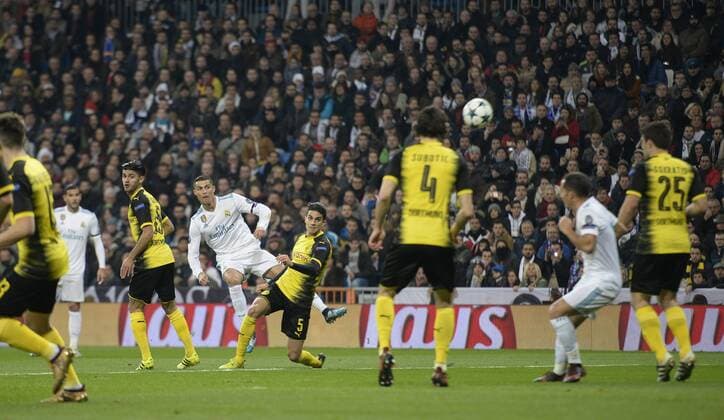Real Madrid s Cristiano Ronaldo and Borussia Dortmund s during Champions League Group H match 6. December 6,2017.  (7049)