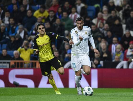 Real Madrid s Theo Hernandez and Borussia Dortmund s Marc Bartra during Champions League Group H match 6. December 6,2017.  (8437)