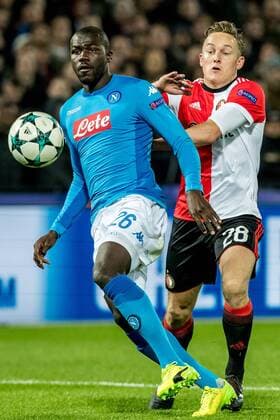 ROTTERDAM - Feyenoord - Napoli , Voetbal , Seizoen 2017 2018 , Champions League , Stadion Feijenoord de Kuip , 06-12-2017 , Feyenoord speler Jens Toornstra (r) in duel met Napoli speler Kalidou Koulibaly (l) Feyenoord - Napoli  x1848921x