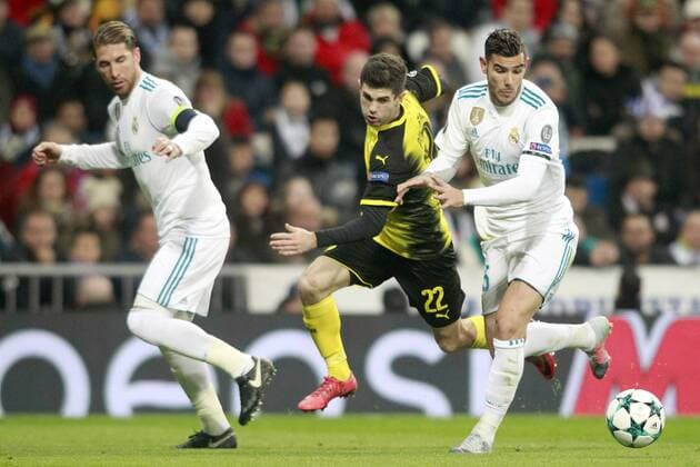 Real Madrid s Sergio Ramos (l) and Theo Hernandez (r) and Borussia Dortmund s Christian Pulisic during Champions League Group H match 6. December 6,2017.  (2017120688)