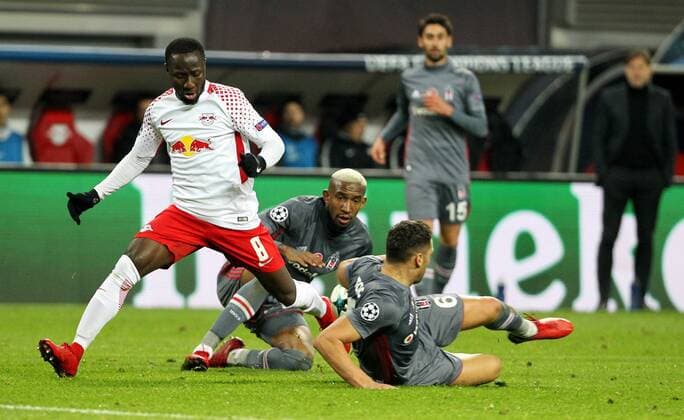 GER UEFA Champions League preliminary round RasenBallsport Leipzig vs Besiktas Istanbul 06 12 17 Leipzig Red Bull Arena GER season 2017 2018 UEFA Champions League group G RasenBallsport Leipzig vs Besiktas Istanbul pictured Naby Deco Keita Leipzig on the ball Talisca and Dusko Tosic Besiktas on the ground