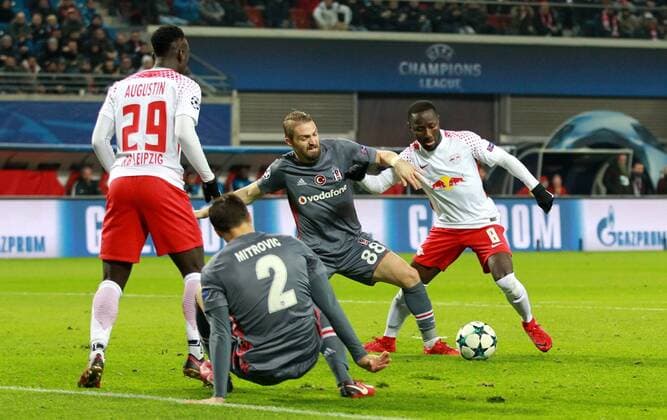 GER UEFA Champions League preliminary round RasenBallsport Leipzig vs Besiktas Istanbul 06 12 17 Leipzig Red Bull Arena GER season 2017 2018 UEFA Champions League group G RasenBallsport Leipzig vs Besiktas Istanbul in picture Naby Deco Keita Leipzig against Caner Erkin Besiktas