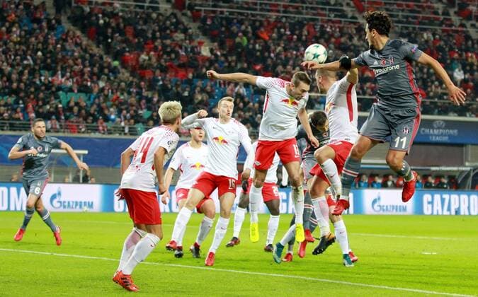 GER UEFA Champions League preliminary round RasenBallsport Leipzig vs Besiktas Istanbul 06 12 17 Leipzig Red Bull Arena GER season 2017 2018 UEFA Champions League group G RasenBallsport Leipzig vs Besiktas Istanbul in the picture Lukas Klostermann Stefan Ilsanker and Diego Demme Leipzig against Mustafa Pektemek Besiktas