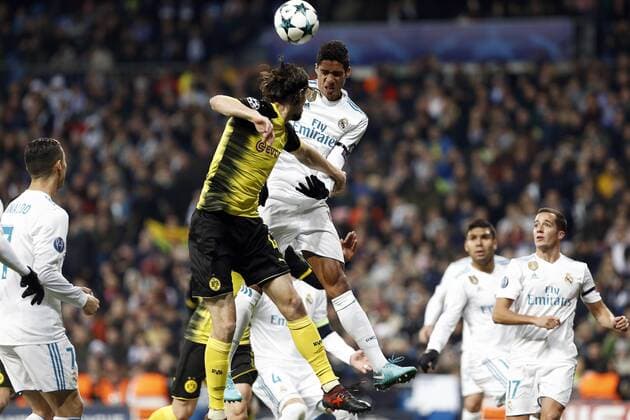 December 6, 2017 - Madrid, Spain - Raphael Varane of Real Madrid and Subotic of Borussia Dortmund all battle to win a header during the UEFA Champions League group H match between Real Madrid and Borussia Dortmund at Estadio Santiago Bernabeu. Soccer 2017: Real Madrid 3:2 Dortmund - ZUMAs197 20171206_zaa_s197_070 Copyright: xManu_reinox