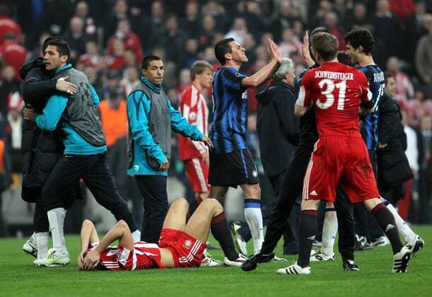 Mario Gomez is crying the lawn while Lucio his teammates Ranocchia Joy game Bayern Munich Inter Milan 2 slaps down recorded during the Champions League 3 on 15 03 2011 at the Allianz Arena Munich Bavaria Germany