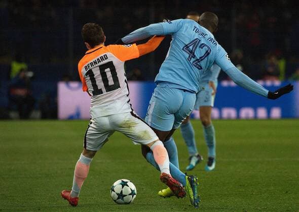 Midfielder Bernard (L) of FC Shakhtar Donetsk and midfielder Yaya Toure of Manchester City FC are seen in action during the UEFA Champions League Group F match at the Metalist Stadium in Kharkiv, northeastern Ukraine, December 6, 2017. Ukrinform. KHARKIV. FC Shakhtar Donetsk has beaten Manchester City FC 2-1 in the UEFA Champions League Group F match at Kharkiv s Metalist Stadium. Pitmen?s midfielder Bernard and defender Ismaily put their team in the lead in the first half (26?, 32? respectively). The visitors managed to score in added time when Manchester City?s forward Sergio Aguero took a successful penalty kick. Thus, FC Shakhtar Donetsk secured the second place in Group F and put an end to a winning streak of Manchester City FC this season. To celebrate his team?s victory, coach Paulo Fonseca appeared at the post-match news conference dressed as Zorro. The Shakhtar manager fulfilled his promise he had made if the Ukrainian champions reached the knockout stage of the Champions League. Shakhtar defeats Manchester City in Kharkiv  Copyright: xDanilxShamkinx