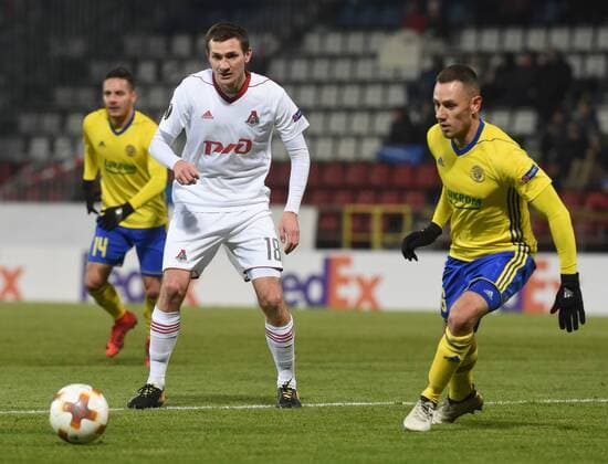 L-R Daniel Holzer of Zlin, Aleksandr Kolomeytsev of Lokomotiv and Zoran Gajic of Zlin in action during the 6th round, group F, European League soccer match FC Fastav Zlin vs FC Lokomotiv Moscow in Olomouc, Czech Republic, December 7, 2017. (CTKxPhoto LudekxPerina) CTKPhotoP201712071052201  LPE 002