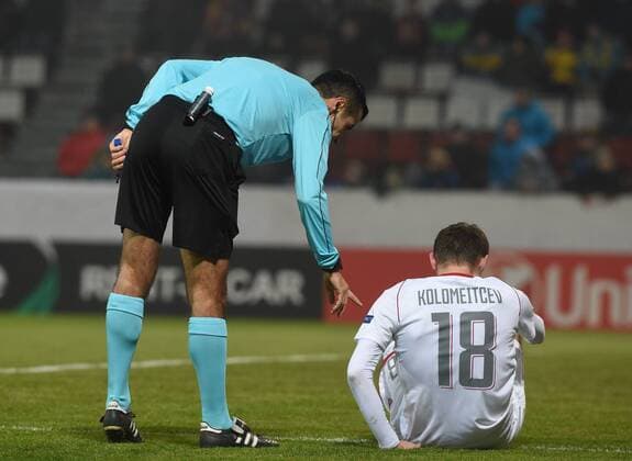 Head referee Mete Kalkavan, left, speaks to Aleksandr Kolomeytsev of Lokomotiv during the 6th round, group F, European League soccer match FC Fastav Zlin vs FC Lokomotiv Moscow in Olomouc, Czech Republic, December 7, 2017. (CTKxPhoto LudekxPerina) CTKPhotoP201712071073501  LPE 004
