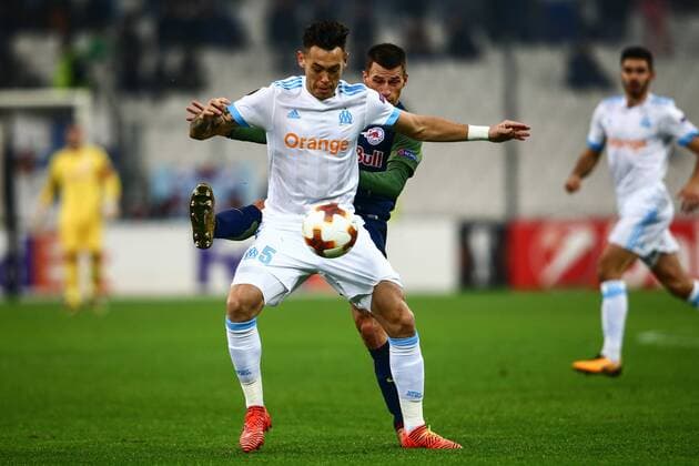 SOCCER - EL, Marseille vs RBS MARSEILLE,FRANCE,07.DEC.17 - SOCCER - UEFA Europa League, Olympique de Marseille vs Red Bull Salzburg. Image shows Lucas Ocampos (Marseille) and Stefan Lainer (RBS). GEPAxpictures xFelixxRoittner