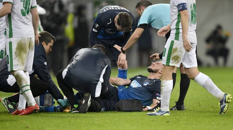 Ermin Bicakcic TSG 1899 Hoffenheim injury is being dealt with by Bettreuern after foul by Claudiu Keserü PFC Ludogorets Razgrad TSG 1899 Hoffenheim vs PFC Ludogorets Razgrad Europa League 07 12 2017 TSG 1899 Hoffenheim vs PFC Ludogorets Razgrad