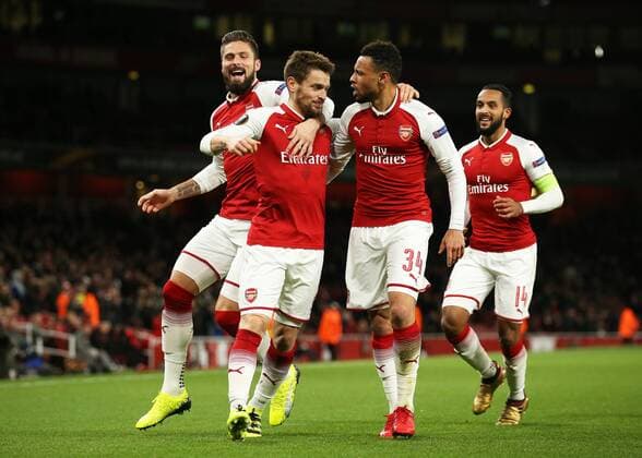 7th December 2017, Emirates Stadium, London, England; UEFA Europa League football, Arsenal versus BATE Borisov; Mathieu Debuchy of Arsenal celebrates after scoring his sides 1st goal in the 1st half to make it 1-0 with Francis Coquelin of Arsenal and Olivier Giroud of Arsenal  ActionPlus11959786