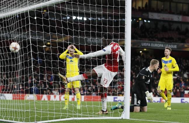 Arsenal s Danny Welbeck smashes the ball after Bate Borisov s Denis Polakov?s (left) own goal during the Europa League Group H match at The Emirates Stadium, London. Picture date: December 7th 2017. Picture credit should read: David Klein Sportimage EDITORIAL USE ONLY. No use with unauthorised audio, video, data, fixture lists, club league logos or live services. Online in-match use limited to 120 images, no video emulation. No use in betting, games or single club league player publications.