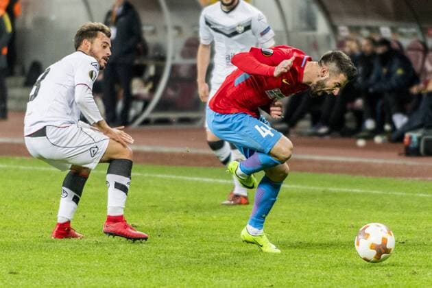 December 8, 2017: Davide Mariani 8 (FC Lugano) and Gabriel Enache 44 (FCSB Bucharest) during the UEFA Europa League 2017-2018, Group Stage, Groupe G game between FCSB Bucharest (ROU) and FC Lugano (CHE) at National Arena Stadium, Bucharest, Romania ROU.  Copyright: xCronos CatalinxSoarex cronoscs8122017115025
