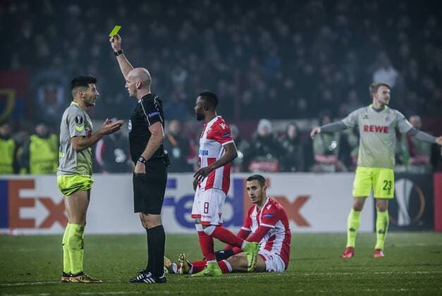 7th December 2017, Rajko Mitic Stadium, Belgrade, Serbia, UEFA Europa League football, Red Star Belgrade versus FC Cologne; The referee shows the yellow card to Midfielder Milos Jojic of FC Kaln  ActionPlus11959847